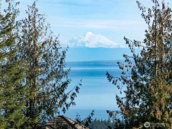 a view of lake with mountain