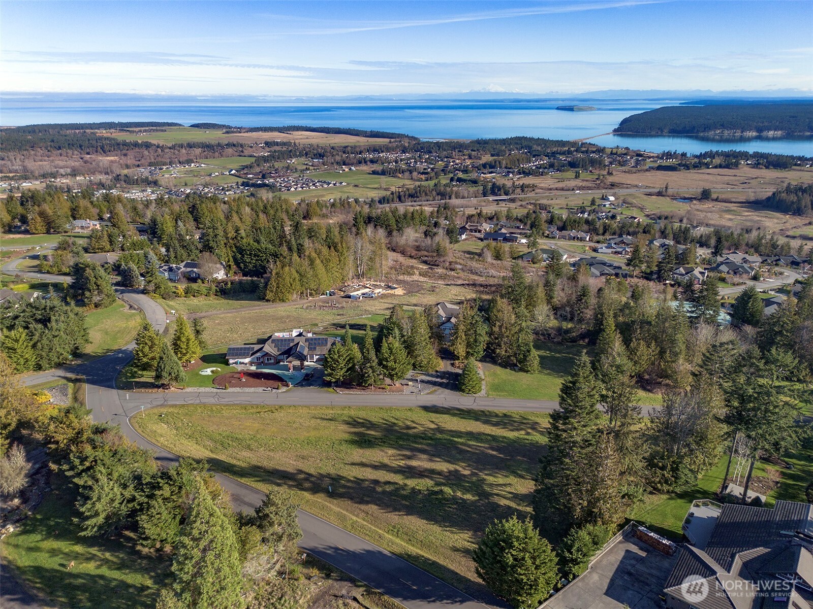 9999 Doe Run Road Sequim, WA 98382 - Photo 14 of 36 an aerial view of a city