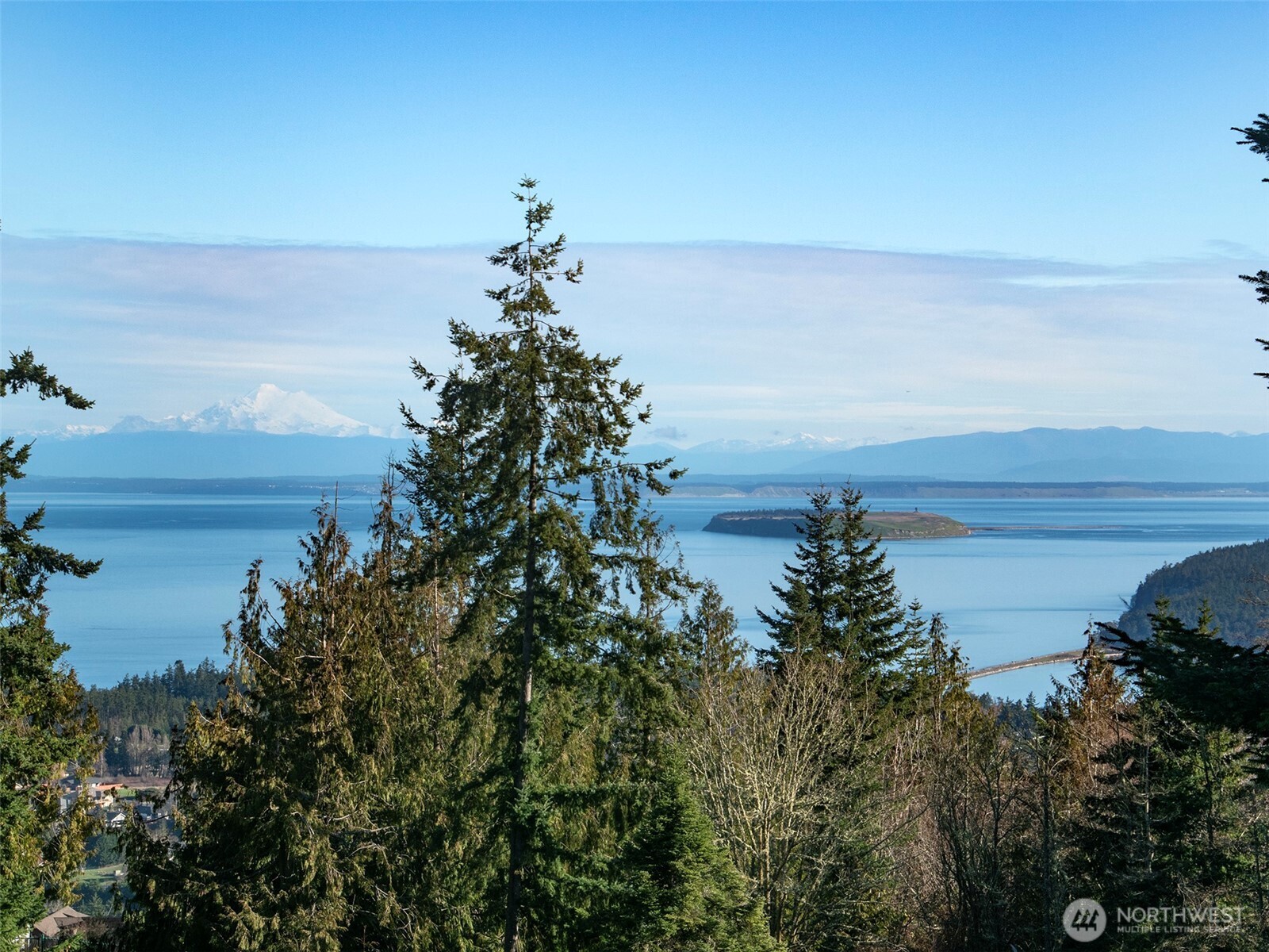 9999 Doe Run Road Sequim, WA 98382 - Photo 2 of 36 a view of a lake and mountain in the back