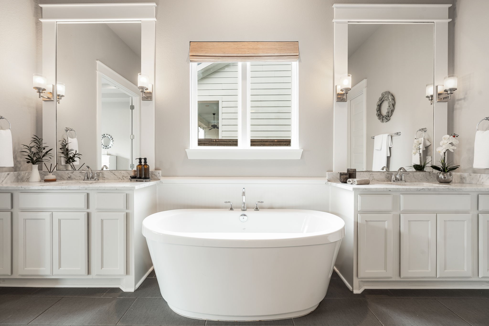 2206 Rope Maker Road Conroe, TX 77384 - Photo 34 of 42 View of tub framed by dual vanities.