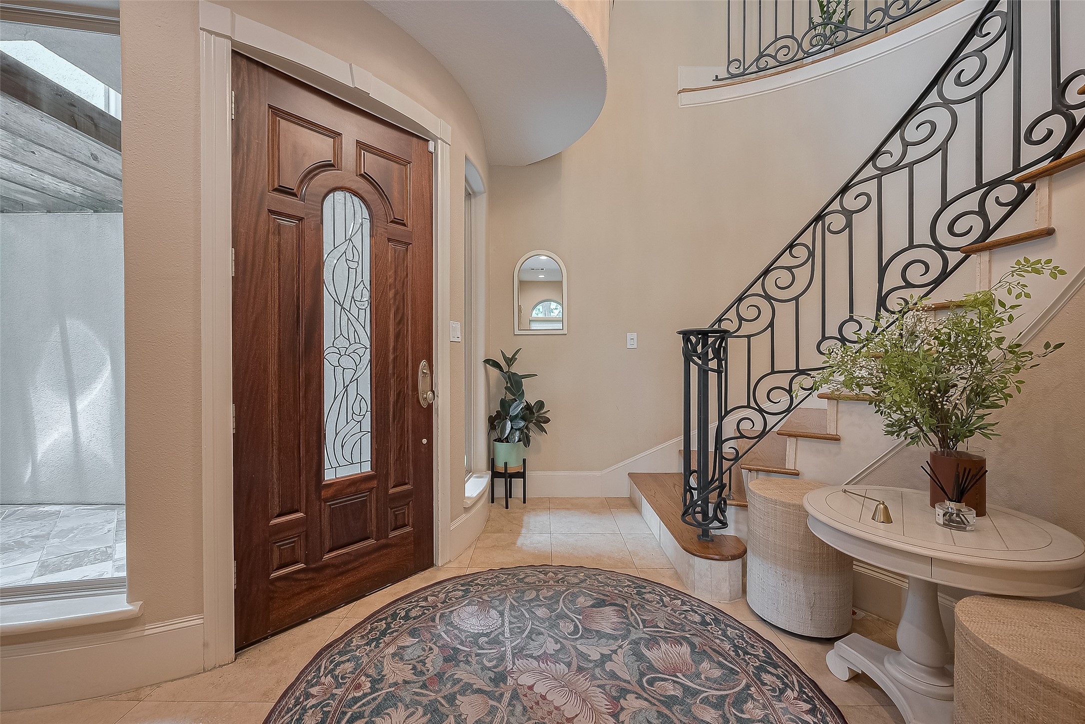 6419 Rodrigo Street Houston, TX 77007 - Photo 3 of 35 Upon entry you are greeted with a beautiful winding staircase with custom crystal chandelier.