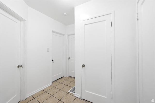 676 South 500 West Provo, UT 84601 - Photo 22 of 29 Unfurnished bedroom with light tile patterned flooring
