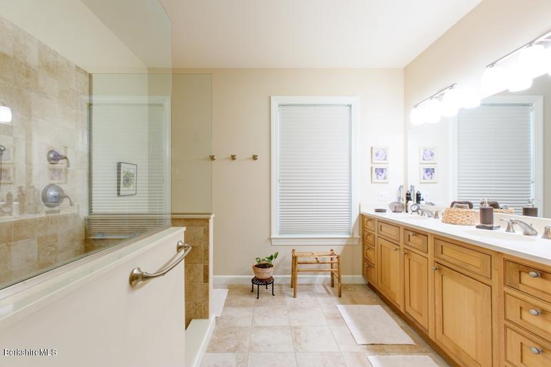 881 South Undermountain Road Sheffield, MA 01257 - Photo 14 of 30 a bath room with a sink and a mirror