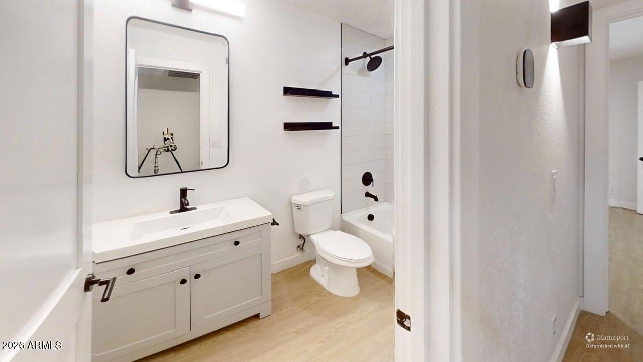 1840 West Thomas Road, Unit 27 Phoenix, AZ 85015 - Photo 11 of 14 1840-w-thomas-rd-bathroom-defurnished