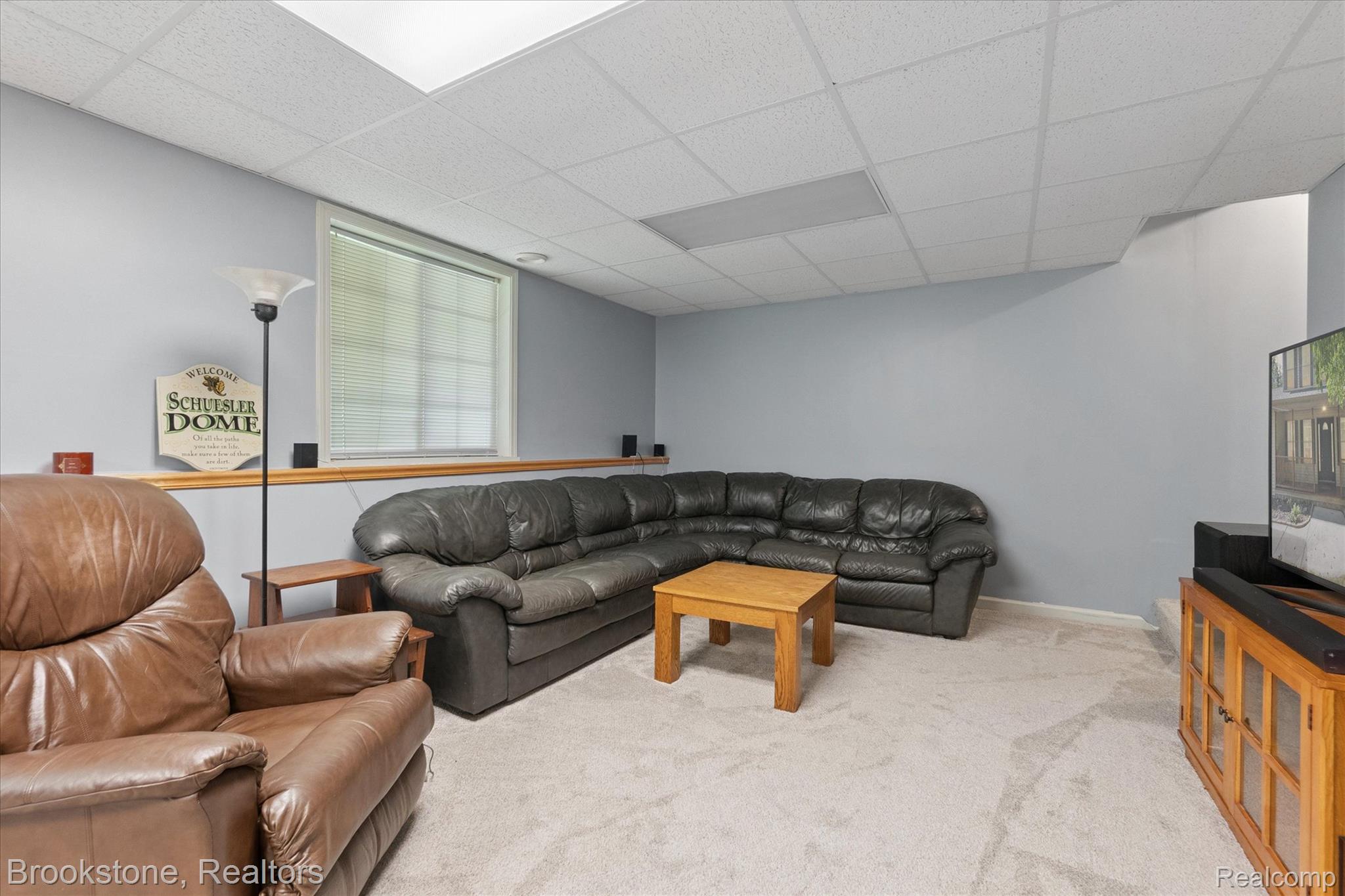 13962 South Beardslee Road Perry, MI 48872 - Photo 36 of 56 Living area featuring a paneled ceiling and carpet flooring