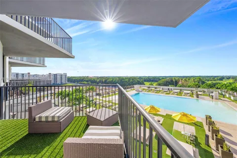 a view of a balcony with couches