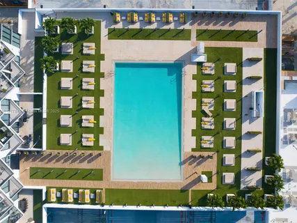 a front view of a building with glass windows and door