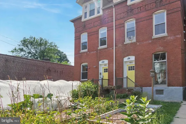 a front view of a multi story residential apartment building