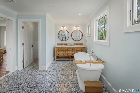 a bathroom with a toilet and a sink