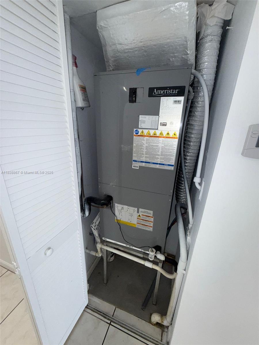 8560 Sherman Circle North, Unit 105 Miramar, FL 33025 - Photo 12 of 14 a view of storage and utility room