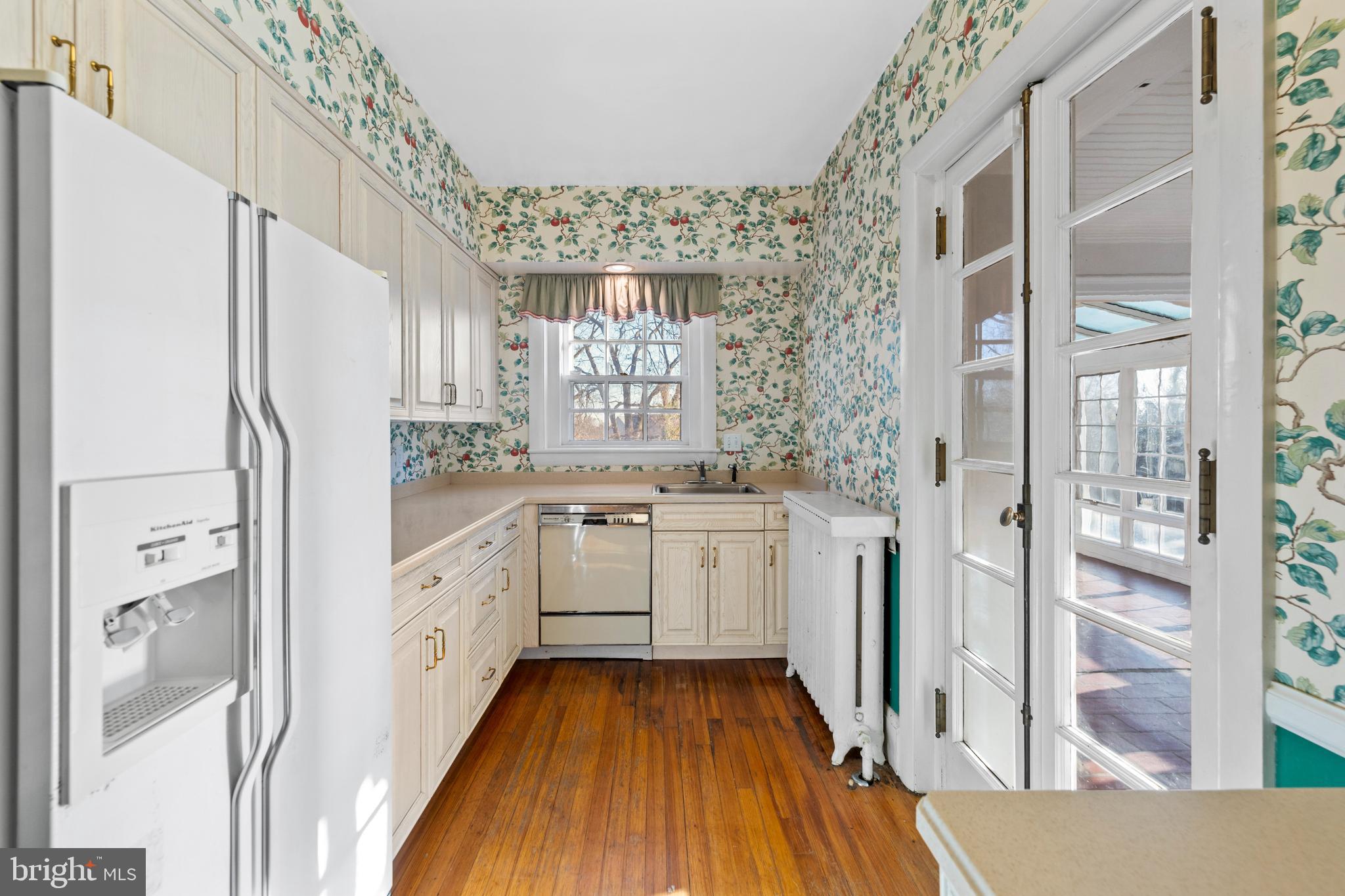 211 Wendover Road Baltimore, MD 21218 - Photo 21 of 70 French Doors to Sunroom