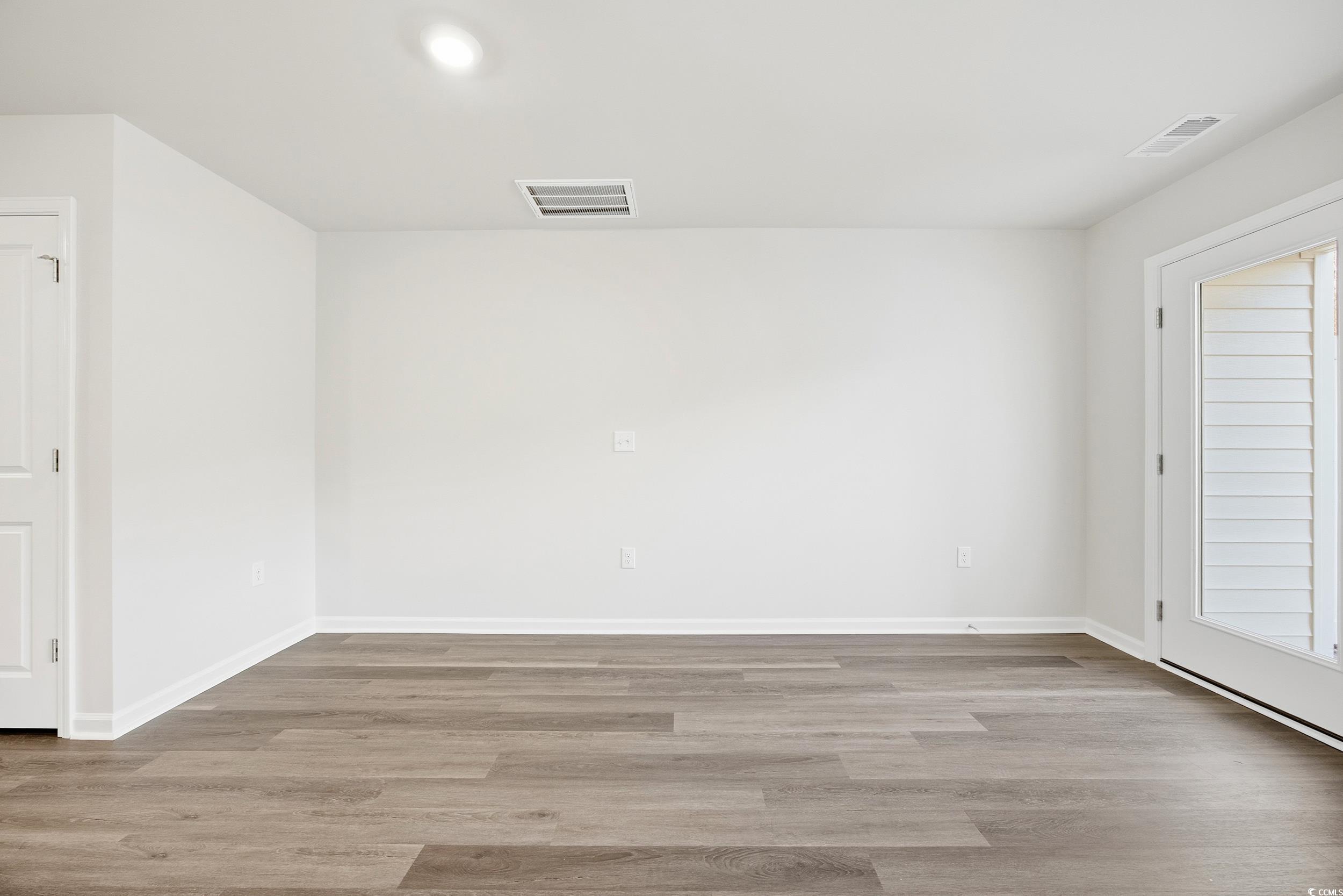 322 Honeystone Street Conway, SC 29526 - Photo 12 of 30 Spare room with light wood-type flooring and recessed lighting