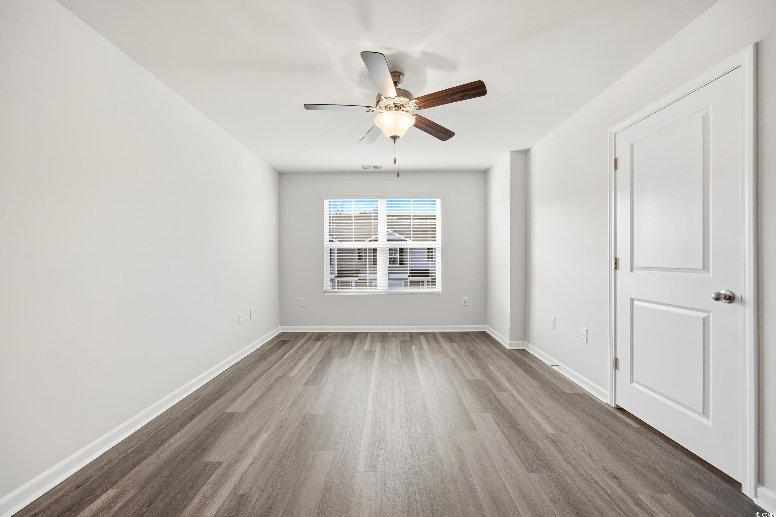 322 Honeystone Street Conway, SC 29526 - Photo 15 of 30 Spare room featuring light wood-style floors and a ceiling fan
