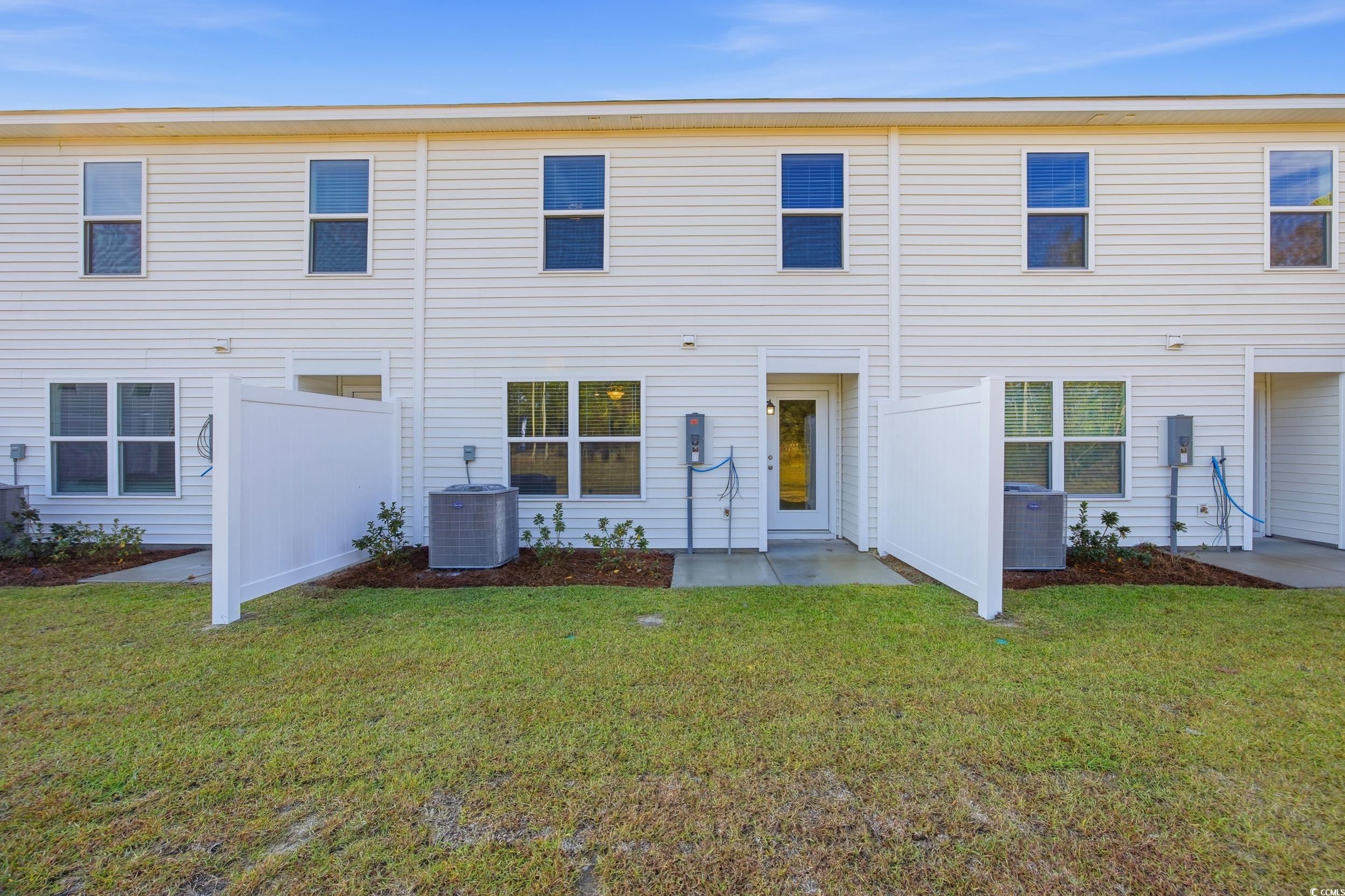 322 Honeystone Street Conway, SC 29526 - Photo 27 of 30 Back of property featuring a yard