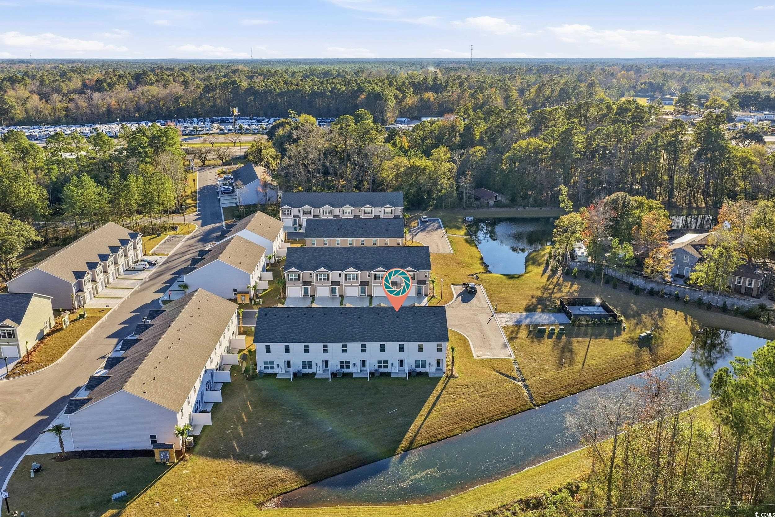 322 Honeystone Street Conway, SC 29526 - Photo 28 of 30 Drone / aerial view of a nearby body of water and a forest