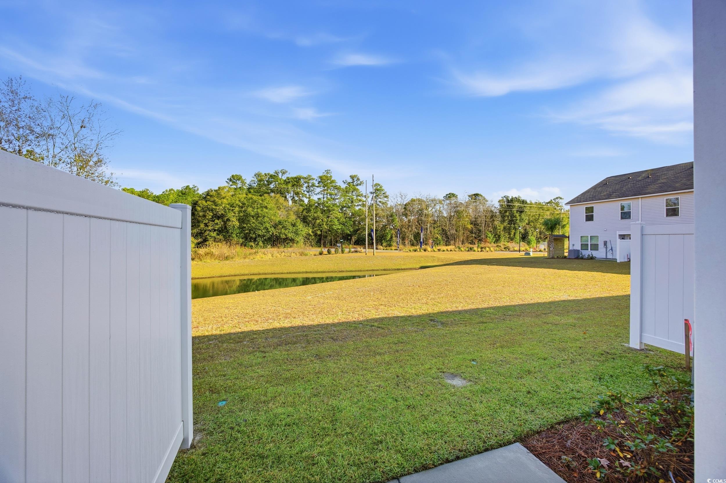 322 Honeystone Street Conway, SC 29526 - Photo 4 of 30 View of grassy yard with a water view