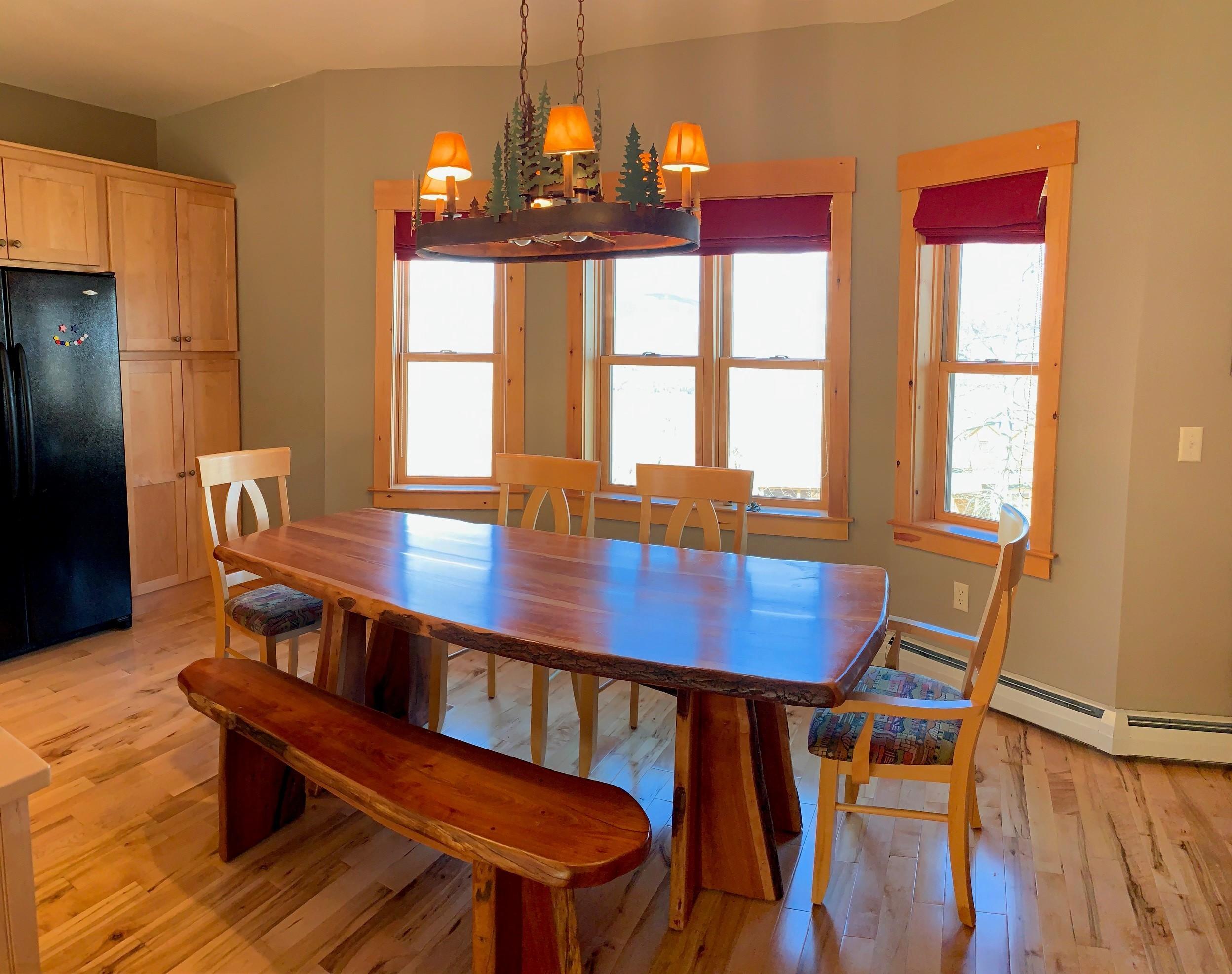7011 Hardwood Ridge Road, Unit 7011 Carrabassett Valley, ME 04947 - Photo 7 of 17 Dining table