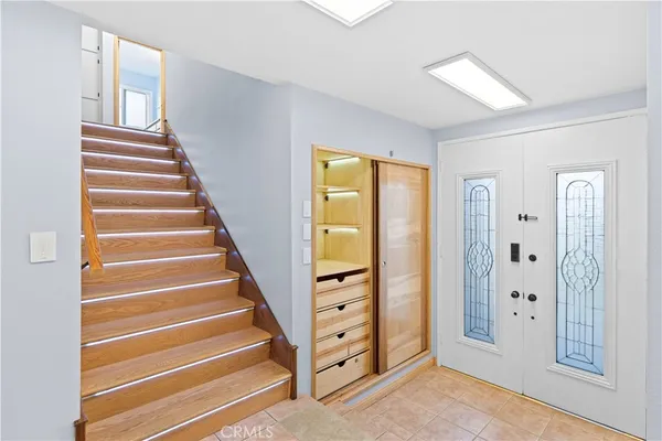 a view of an entryway with staircase