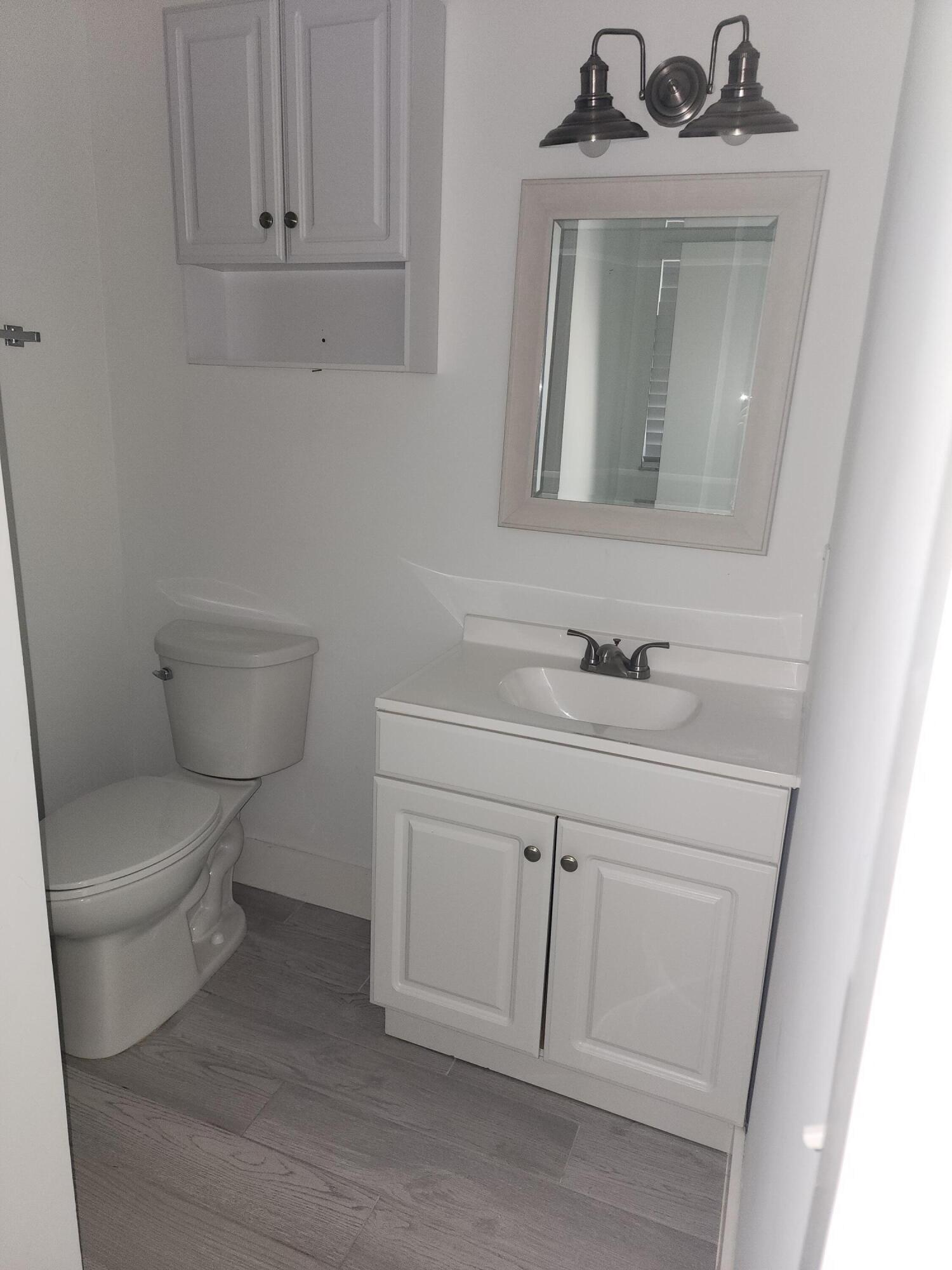 8933 Southeast Hobe Ridge Avenue Hobe Sound, FL 33455 - Photo 15 of 17 Bedroom 1 Private Bath