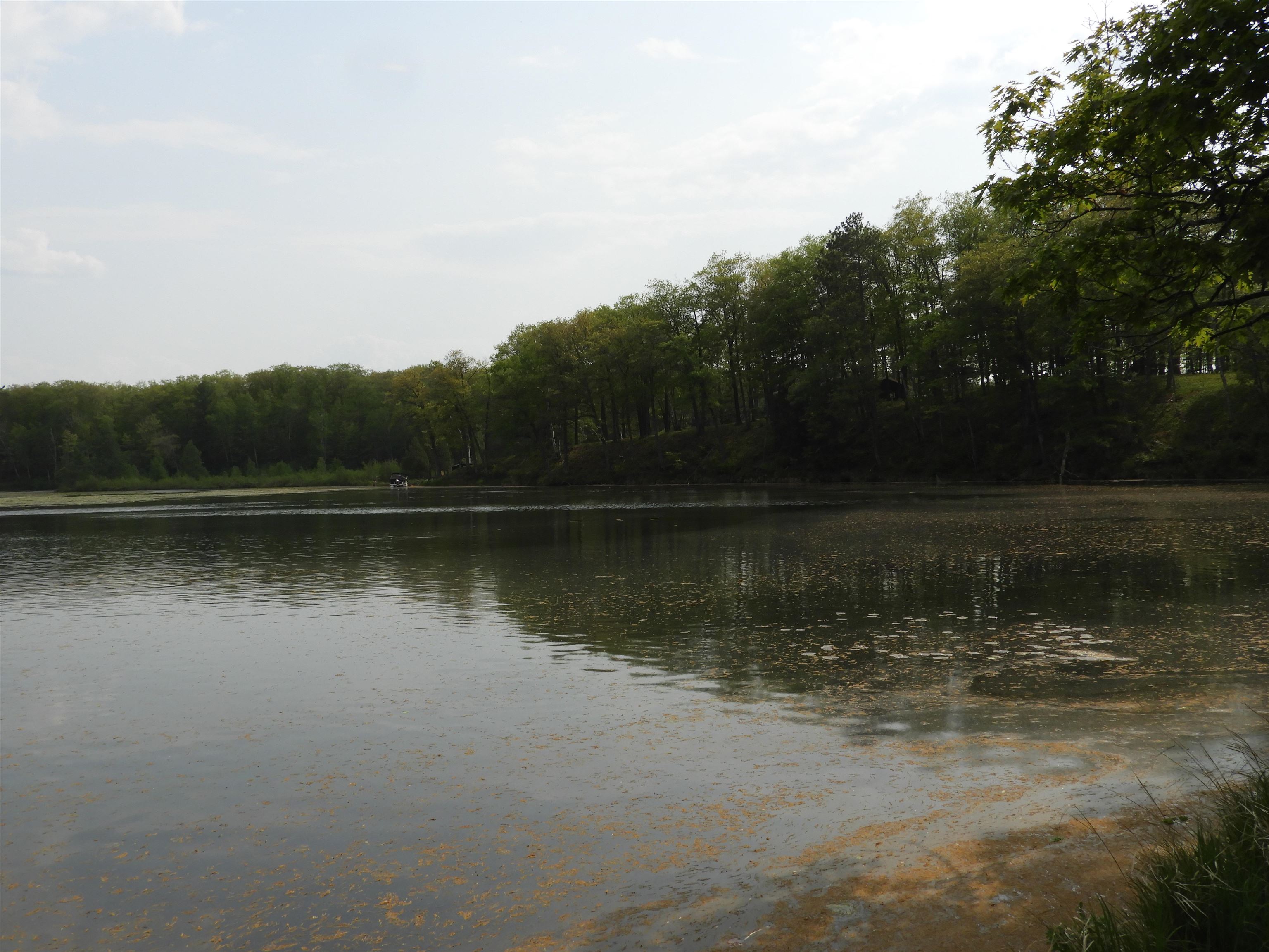 66490 Mieritz Road Iron River, WI 54847 - Photo 23 of 23 Water view featuring a heavily wooded area
