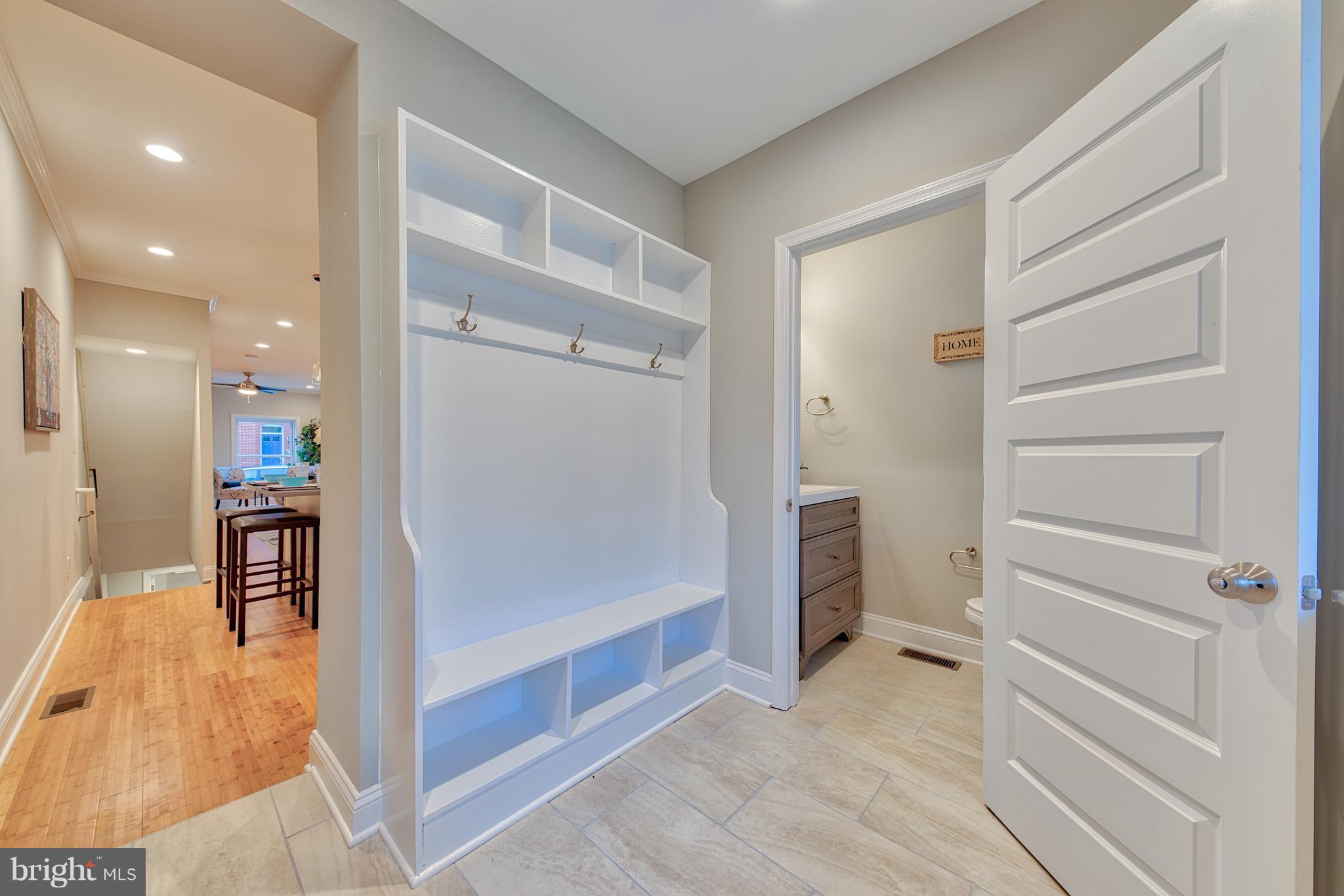 115 North Decker Avenue Baltimore, MD 21224 - Photo 13 of 30 a view of a hallway with closet and windows