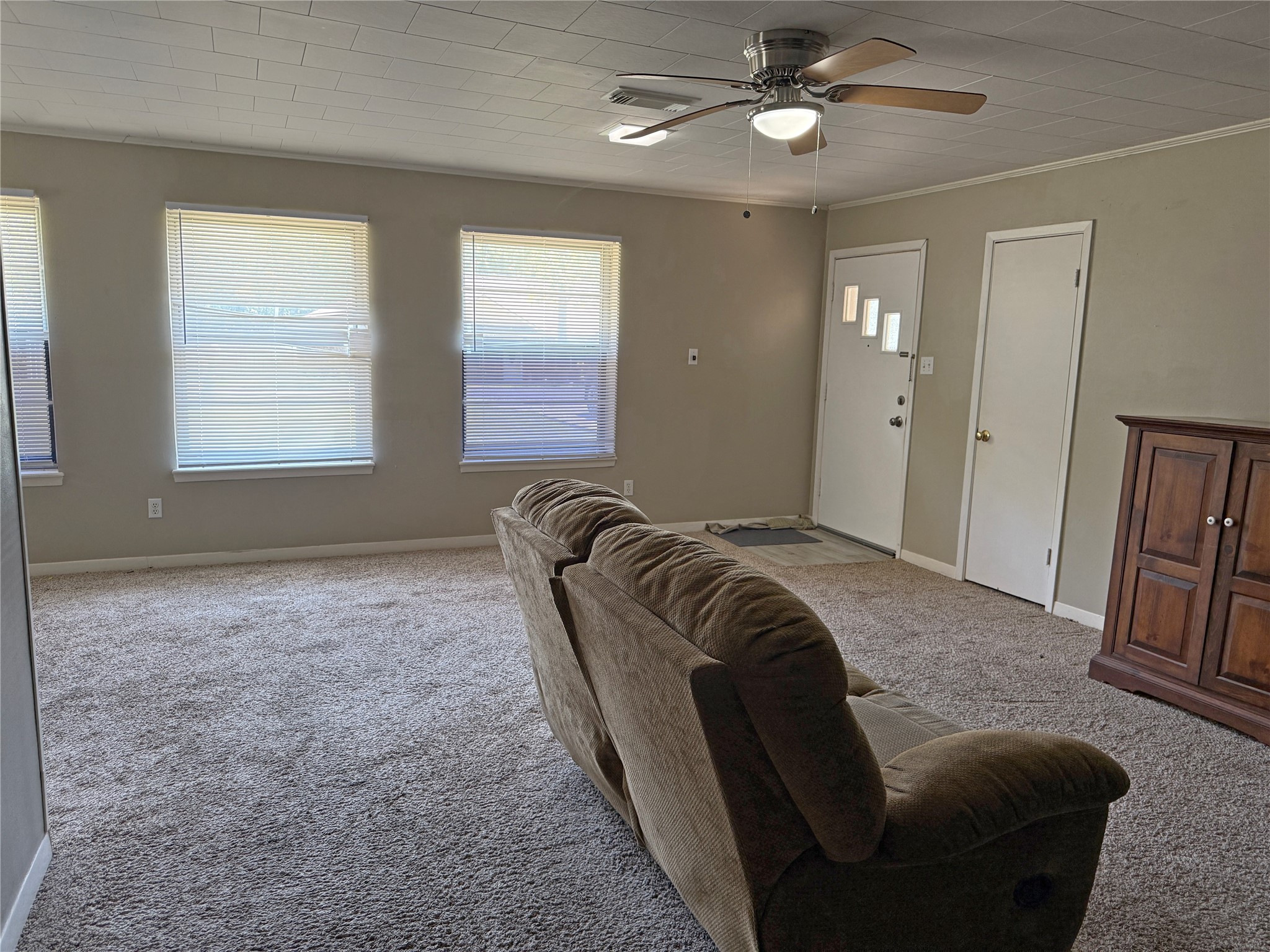 508 Rals Drive Onalaska, TX 77360 - Photo 12 of 42 Living facing front door - lots of natural lighting!
