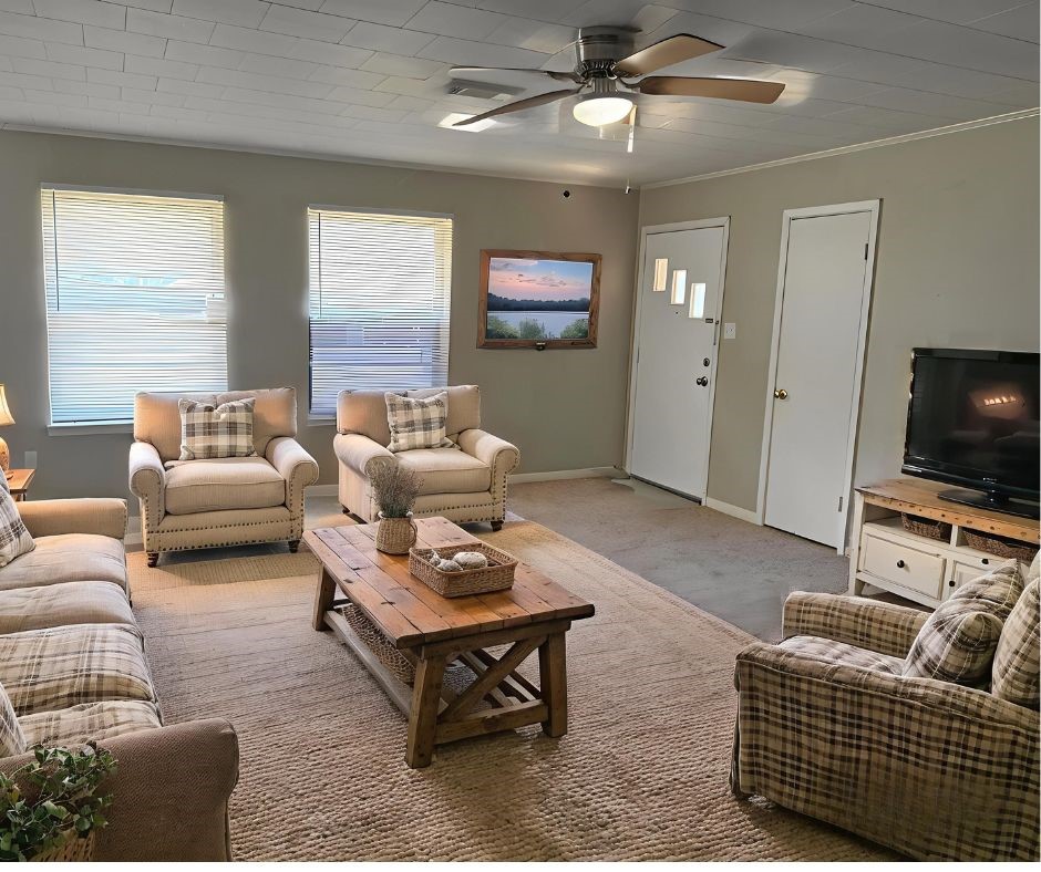 508 Rals Drive Onalaska, TX 77360 - Photo 13 of 42 a living room with furniture and a flat screen tv