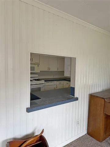 a view of a room with a wardrobe space