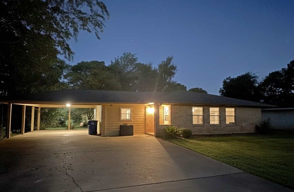 508 Rals Drive Onalaska, TX 77360 - Photo 2 of 42 a view of house next to a yard