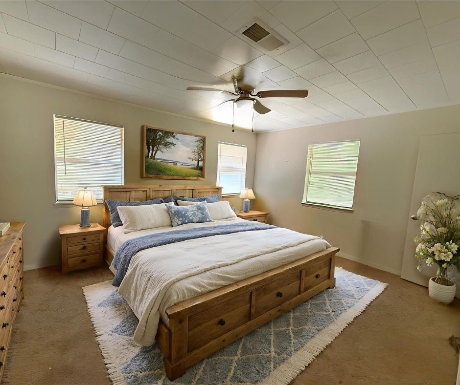 508 Rals Drive Onalaska, TX 77360 - Photo 23 of 42 a bedroom with bed and a window