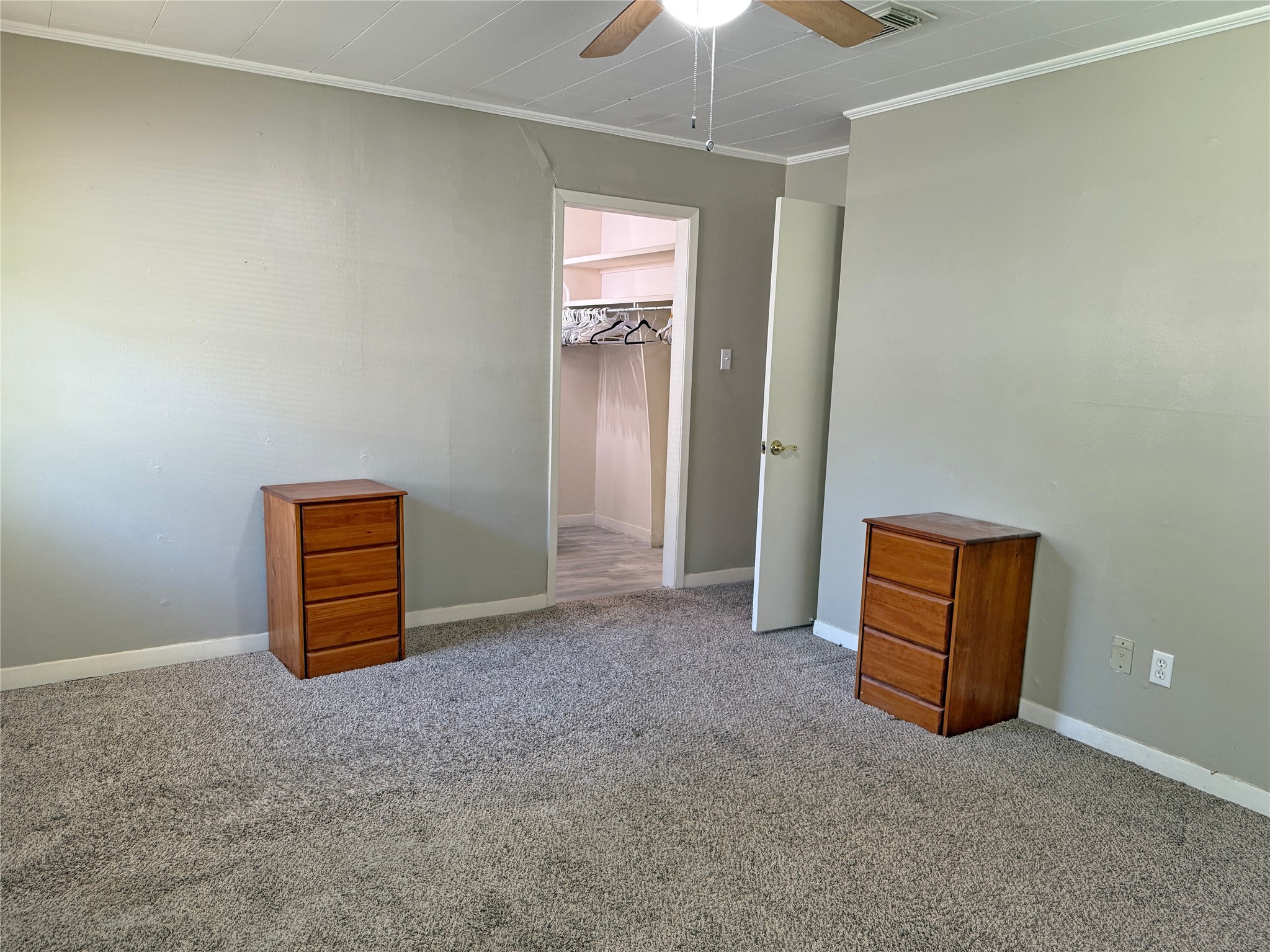 508 Rals Drive Onalaska, TX 77360 - Photo 29 of 42 an empty room with windows and cabinet