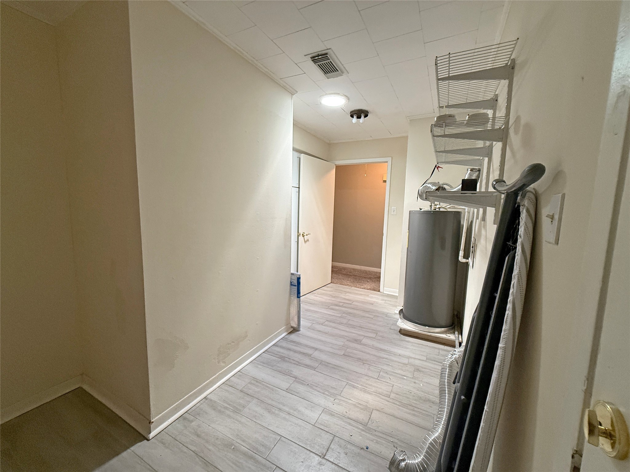 508 Rals Drive Onalaska, TX 77360 - Photo 36 of 42 Utility room facing hallway