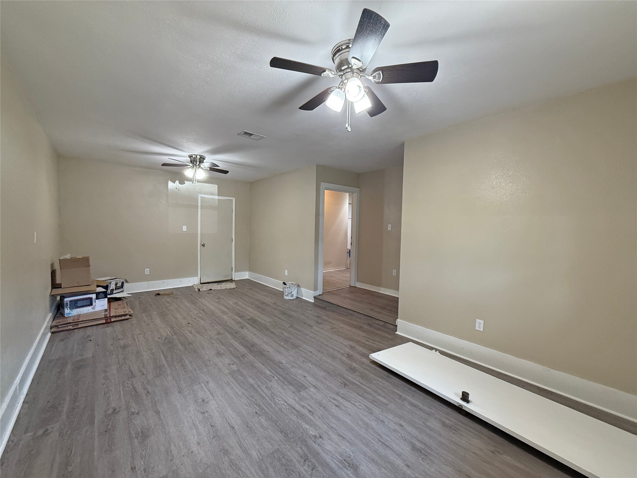 508 Rals Drive Onalaska, TX 77360 - Photo 40 of 42 Really nice big room! The open doorway is the utility room and the closed door is to the outside. Just around the corner is the closet.