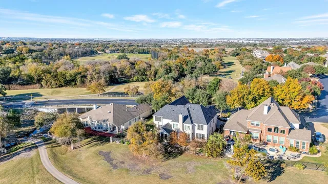 an aerial view of a house with a outdoor space