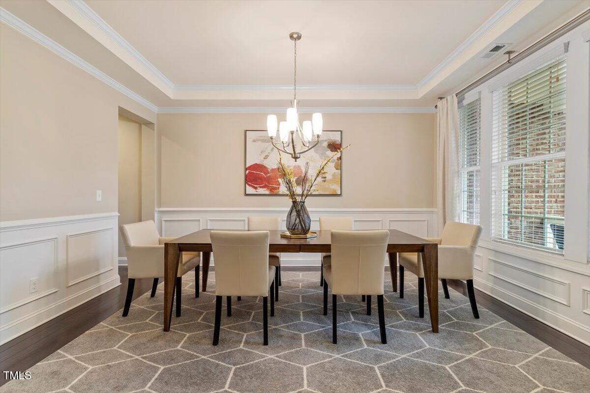 2421 Trenton Park Lane Raleigh, NC 27607 - Photo 12 of 66 a view of a dining room with furniture window and outside view