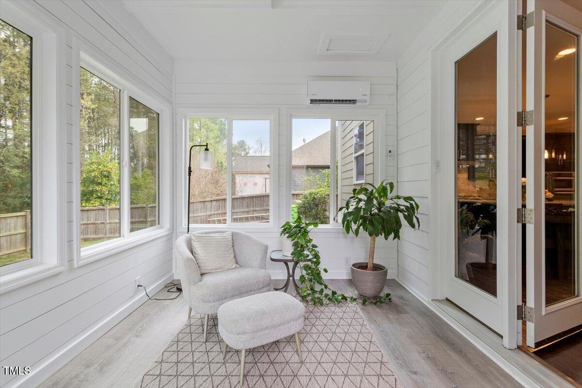 2421 Trenton Park Lane Raleigh, NC 27607 - Photo 42 of 66 a living room with furniture and a potted plant