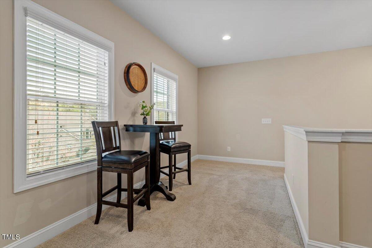 2421 Trenton Park Lane Raleigh, NC 27607 - Photo 44 of 66 a view of a dining room with furniture and window