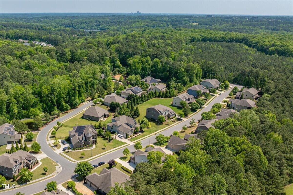 2421 Trenton Park Lane Raleigh, NC 27607 - Photo 6 of 66 an aerial view of residential houses with outdoor space
