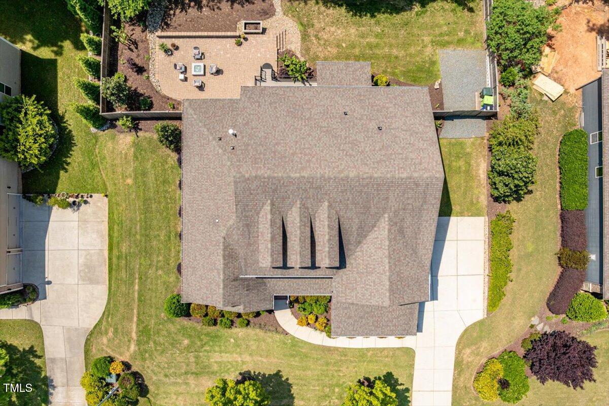 2421 Trenton Park Lane Raleigh, NC 27607 - Photo 61 of 66 aerial view of a house with a swimming pool
