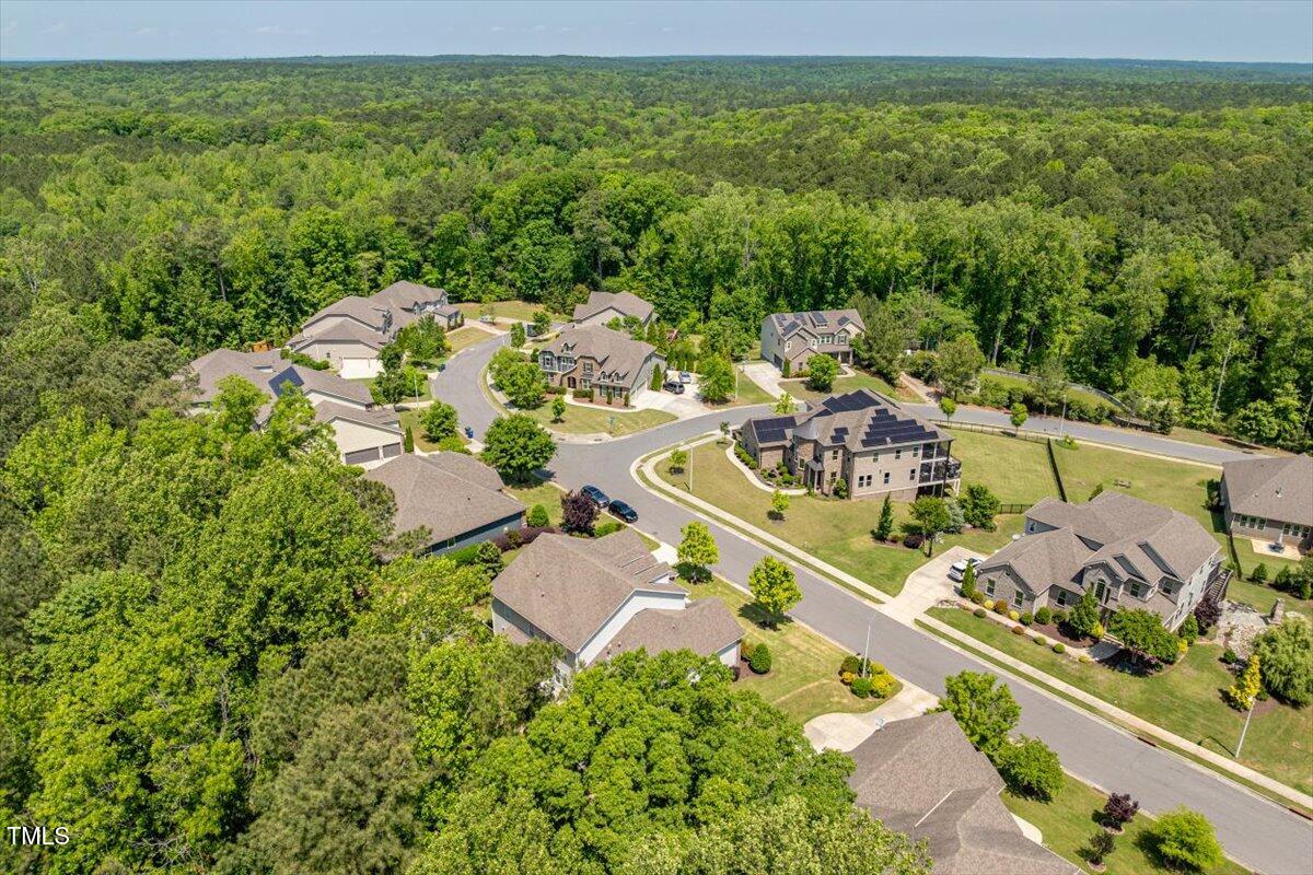 2421 Trenton Park Lane Raleigh, NC 27607 - Photo 66 of 66 an aerial view of a house with a garden