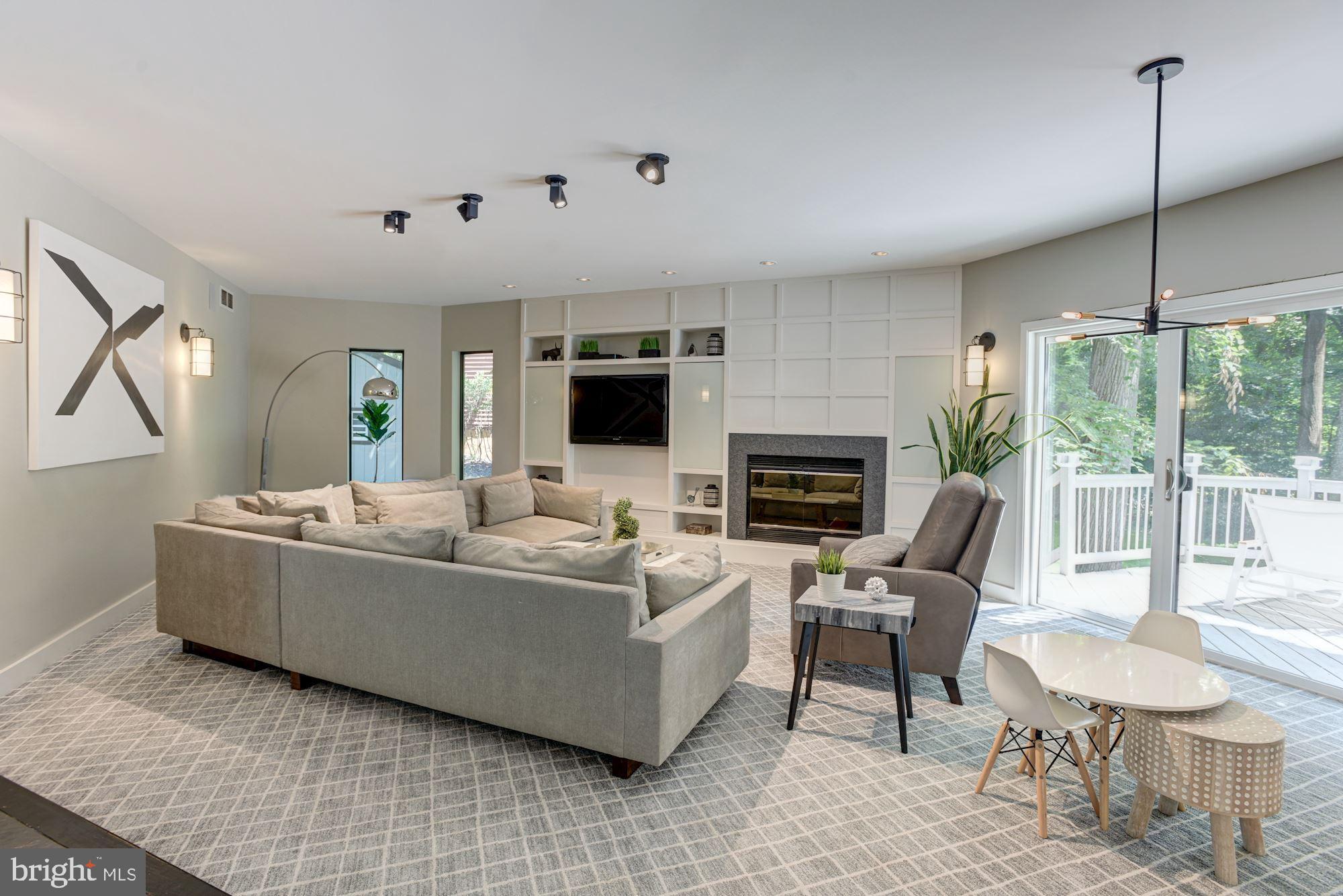 2005 Burdock Road Baltimore, MD 21209 - Photo 19 of 59 Living Room | Fireplace | Custom Cabinetry