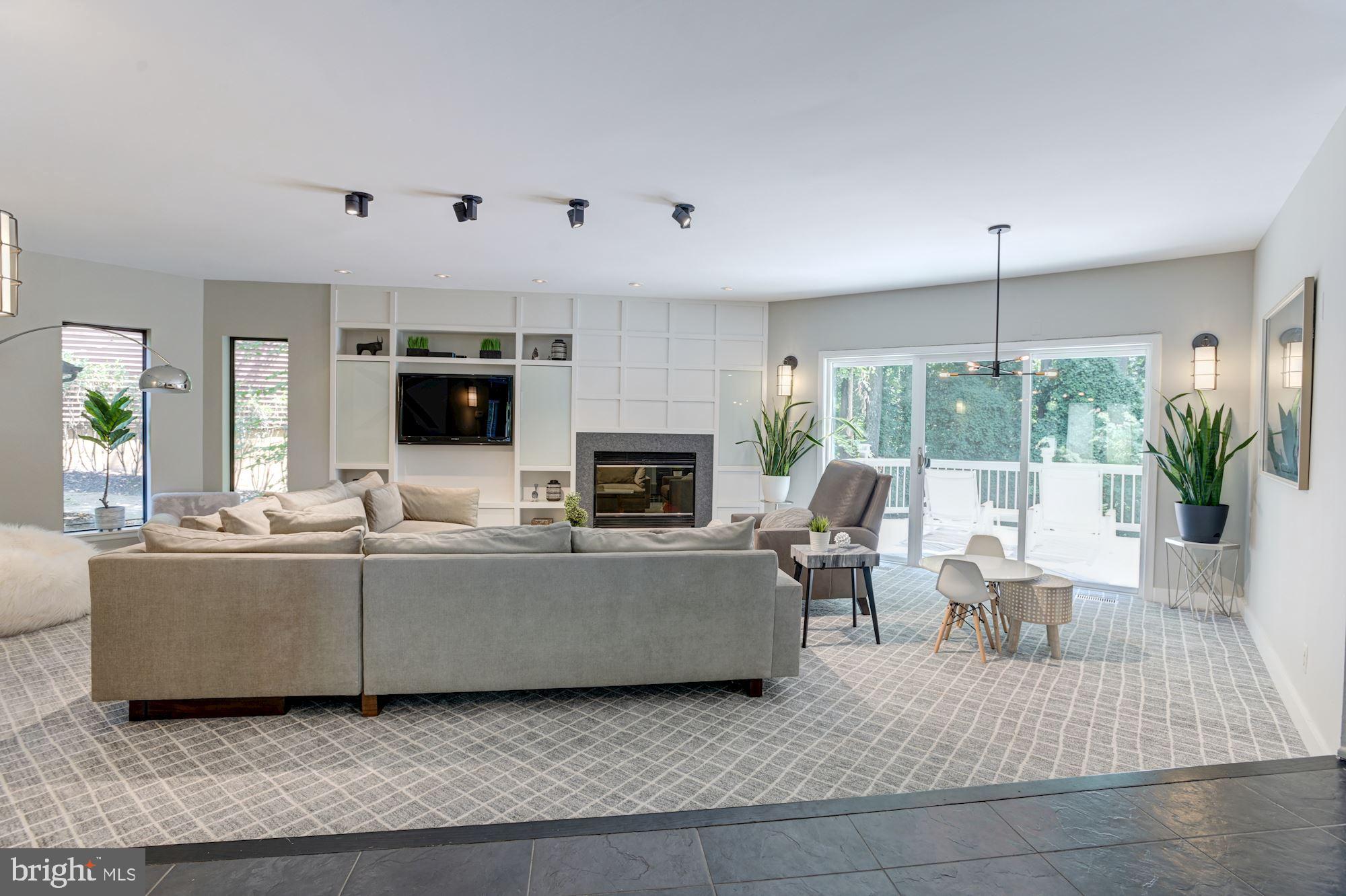 2005 Burdock Road Baltimore, MD 21209 - Photo 20 of 59 Living Room | Fireplace | Custom Cabinetry