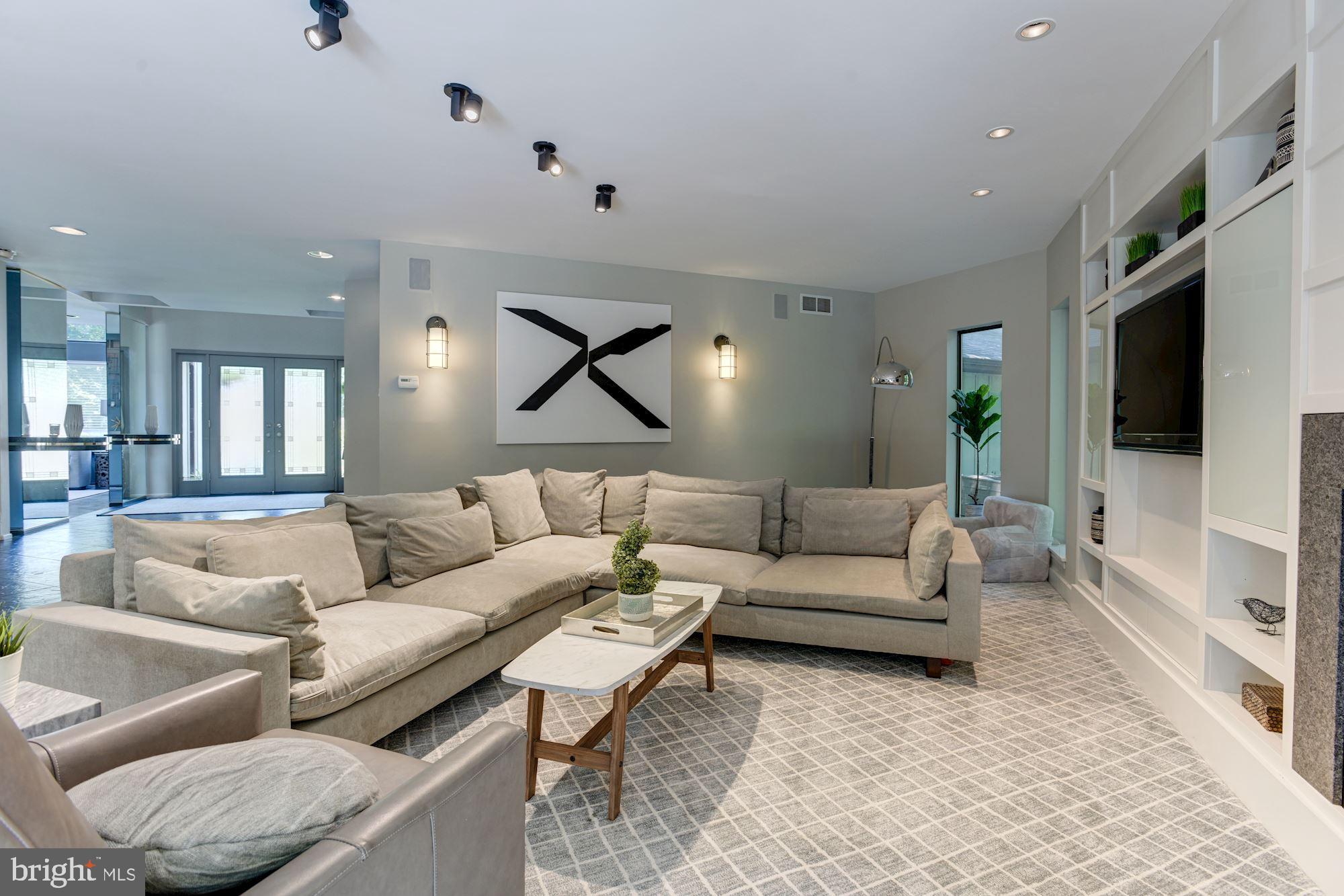 2005 Burdock Road Baltimore, MD 21209 - Photo 21 of 59 Living Room | Fireplace | Custom Cabinetry