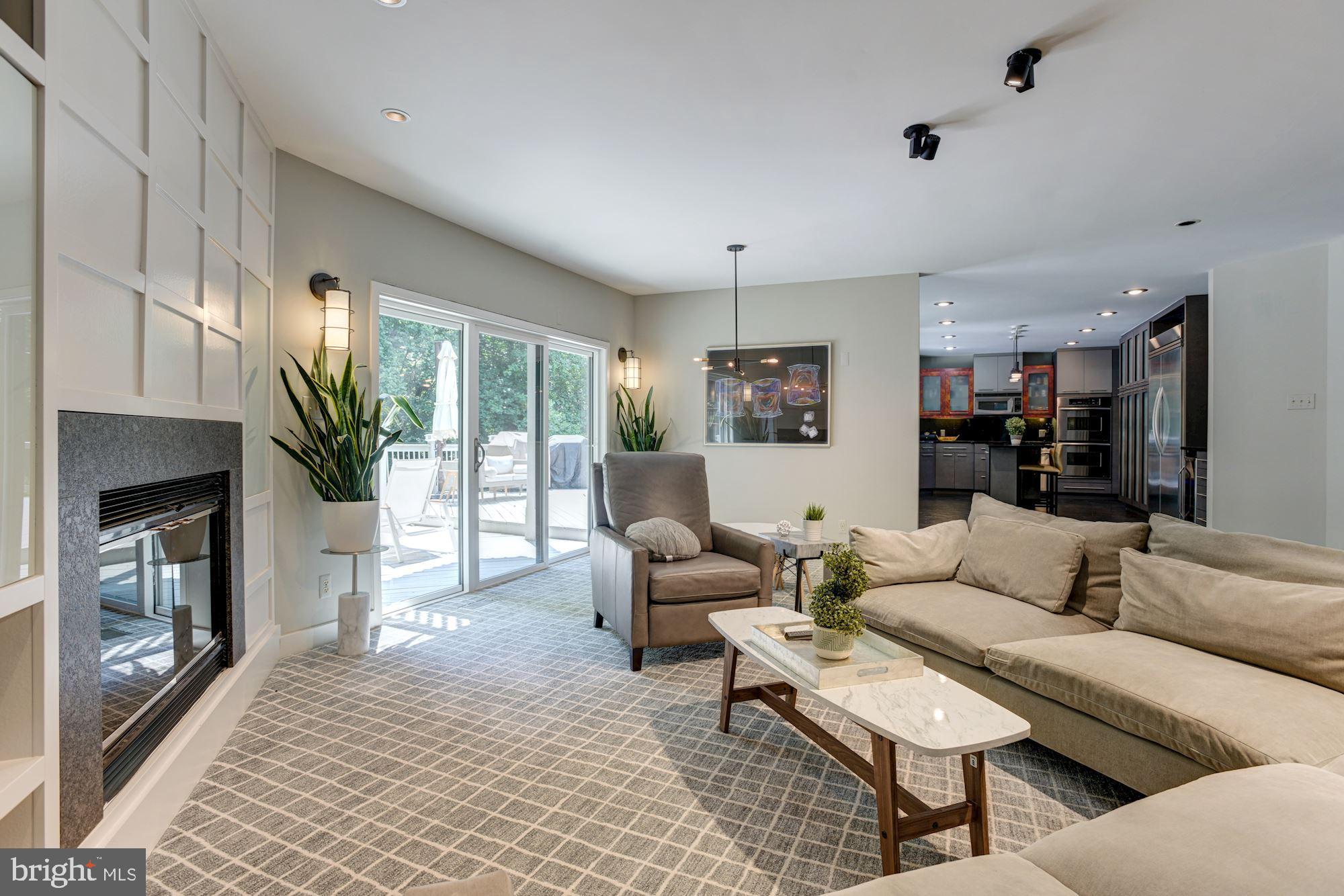 2005 Burdock Road Baltimore, MD 21209 - Photo 22 of 59 Living Room | Fireplace | Custom Cabinetry