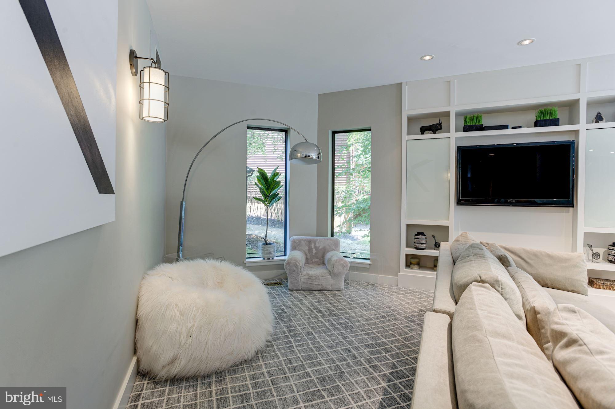 2005 Burdock Road Baltimore, MD 21209 - Photo 23 of 59 Living Room | Fireplace | Custom Cabinetry