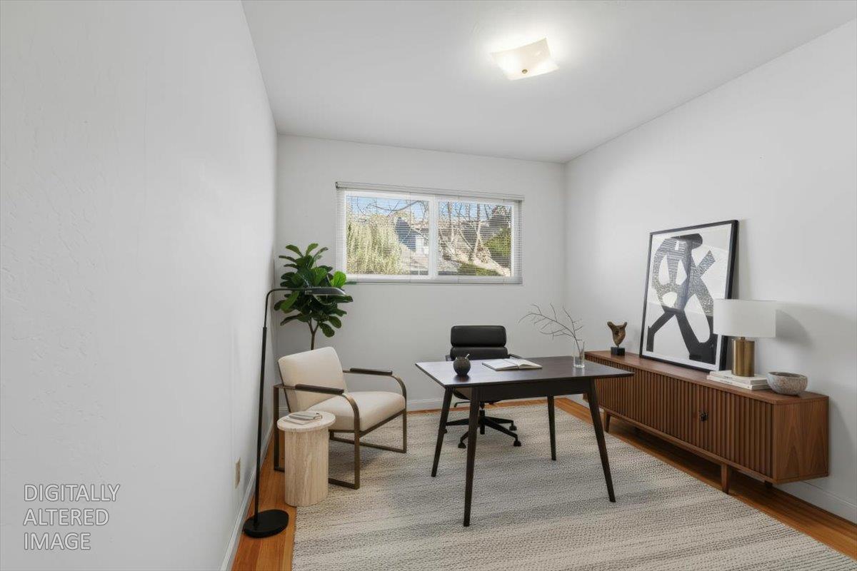 2807 Layton Drive Davis, CA 95618 - Photo 17 of 23 a view of a workspace with furniture and a potted plant