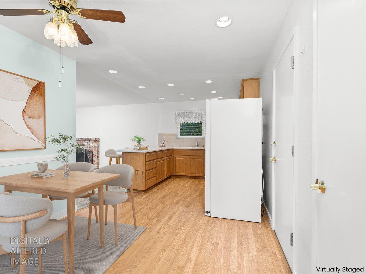 2807 Layton Drive Davis, CA 95618 - Photo 10 of 23 a view of a dining room with furniture and wooden floor