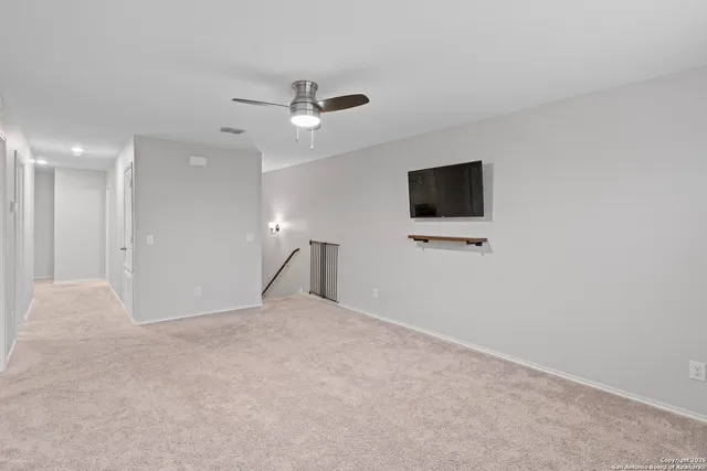 a view of a livingroom with a flat screen tv