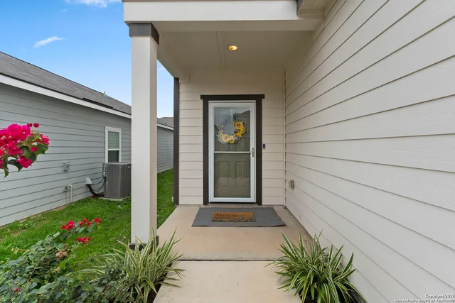 a front view of a house with a porch