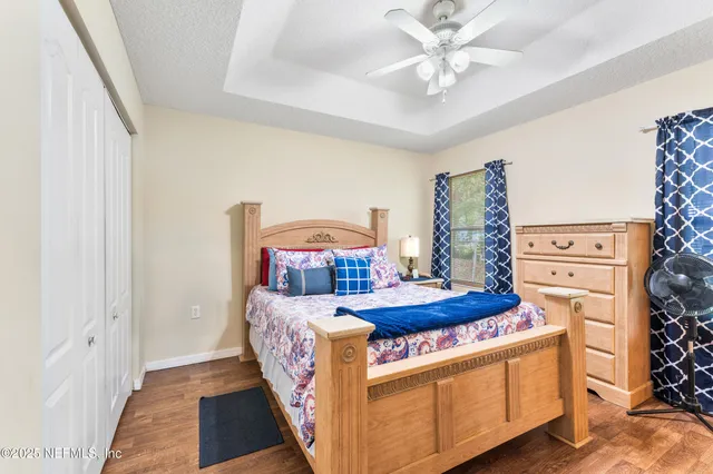 a bed room with a bed and a table